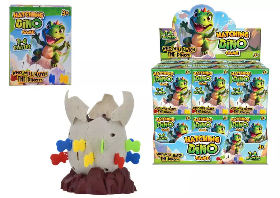 Kandy Toys Pop Up Dino Game toy with colorful dinosaur figures and game components on a flat surface.
