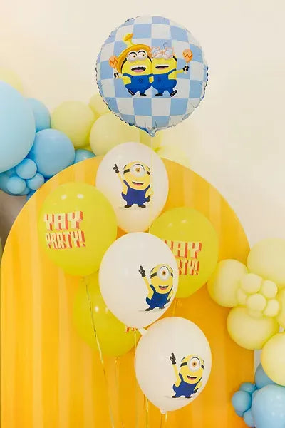 PartyDeco Minions foil balloon, 14-inch, featuring a colorful Minions character for party decoration.