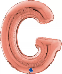 Rose gold 26-inch letter G foil balloon by Grabo, shiny metallic finish, floating against a plain background.