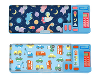 Two Gem Imports pencil cases featuring cars, space, and dinosaurs designs, measuring 9x26x3.5cm, with colorful, themed patterns.