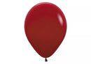 Sempertex Fashion Imperial Red 12-inch latex balloons, 12-pack, used for decorative occasions and celebrations.