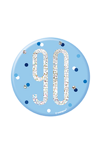Blue Glitz Age 90 badge by Unique, 3-inch celebration badge with sparkling design and bold lettering for special milestone.