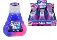 Bright neon galaxy slime toy by Kandy Toys with swirling purple, blue, and pink colors in a soft, stretchy slime form.