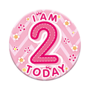 Six small Tiger Feet birthday badges featuring the number 2 for age celebration, with colorful designs and safety pins.