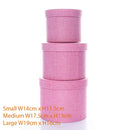 Set of three textured pink Tulip gift hat boxes in assorted sizes, perfect for gift wrapping and storage.