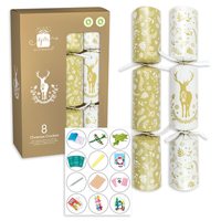 Eight cream and gold cracker party accessories from IG Design Group, 12-inch festive crackers for celebrations.