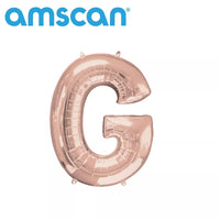 Rose gold Anagram foil balloon shaped as the letter G, 16 inches tall, with shiny metallic finish and smooth curves.