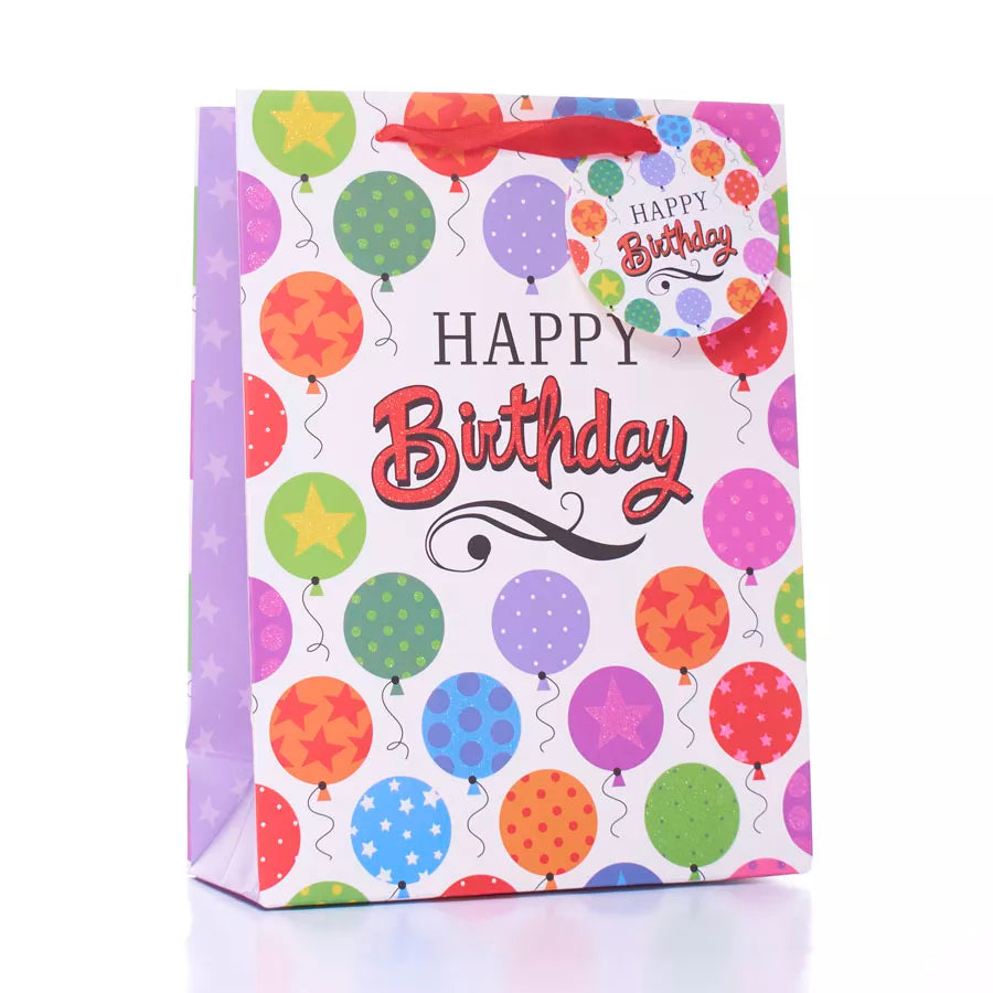Set of six medium Tulip glitter gift bags, decorated with shiny, colorful designs, perfect for wrapping presents or special occasions.