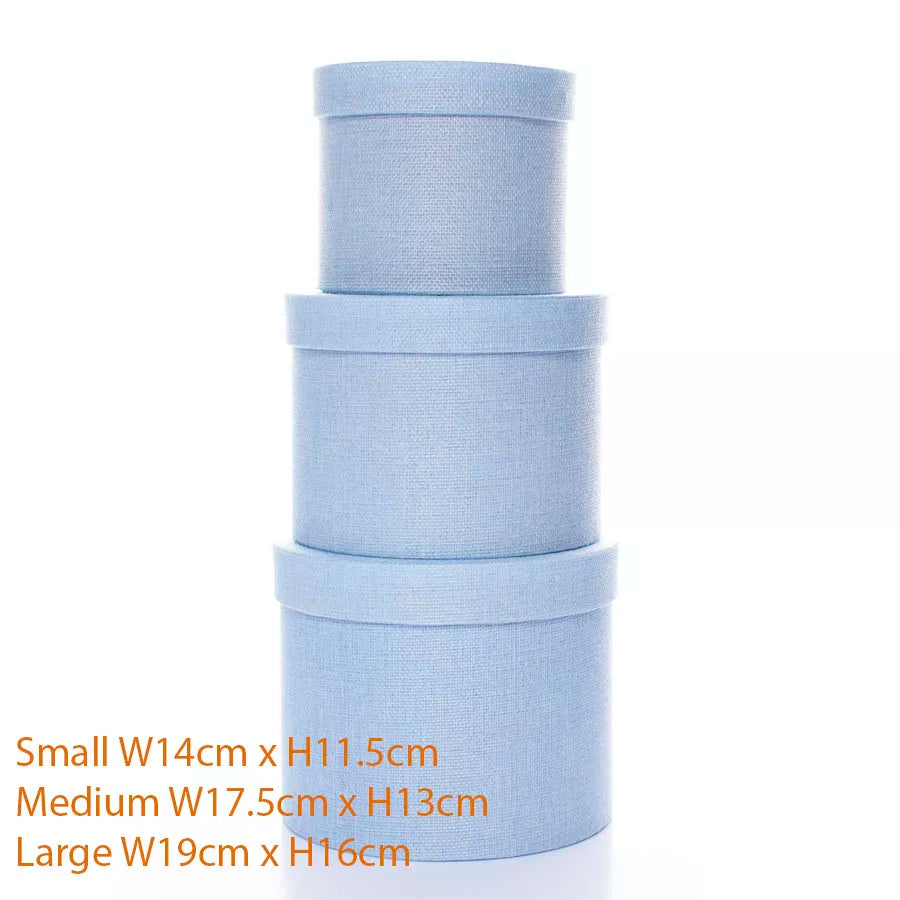 Set of three textured blue Tulip gift hat boxes in assorted sizes, perfect for elegant gift packaging and storage.