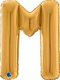 Gold Grabo foil balloon shaped as the letter M, 26 inches tall, shiny metallic finish, perfect for celebrations or decorations.