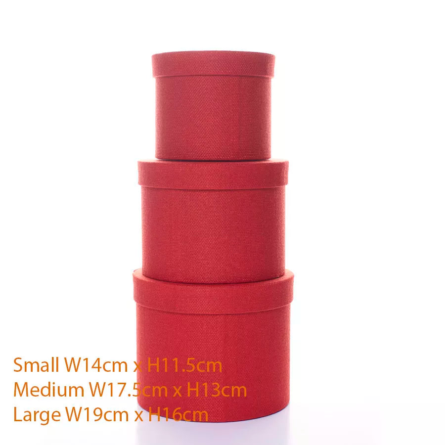 Set of three textured red Tulip hat gift boxes in assorted sizes, perfect for elegant gift packaging and storage.