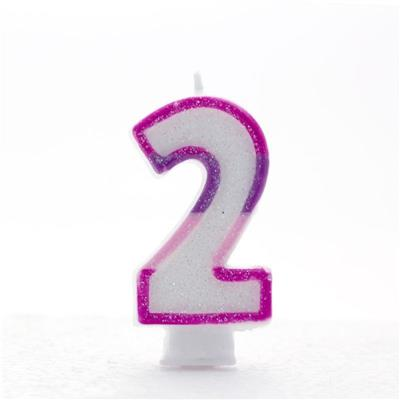 Pink glitter number 2 party candle by APAC, designed for celebrations, with a shiny, decorative finish.
