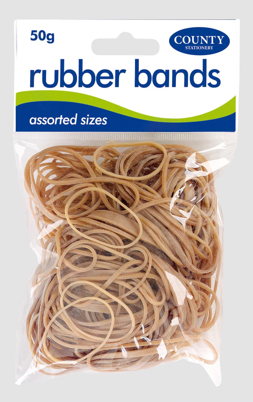 Natural white rubber bands in 50g pack by County Stationery, shown stretched around papers and office supplies.